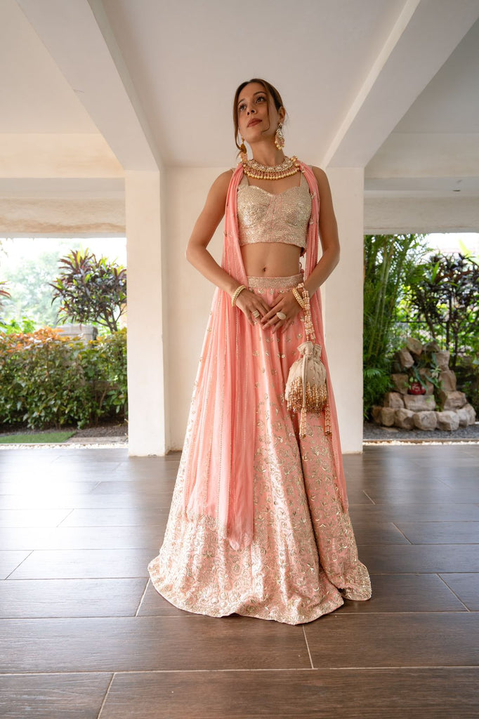 DAISY PEACHY LEHENGA AND CORSET BLOUSE